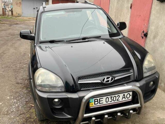 Черный Хендай Туксон, объемом двигателя 2 л и пробегом 270 тыс. км за 7600 $, фото 1 на Automoto.ua