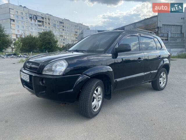 Черный Хендай Туксон, объемом двигателя 2 л и пробегом 270 тыс. км за 7300 $, фото 1 на Automoto.ua
