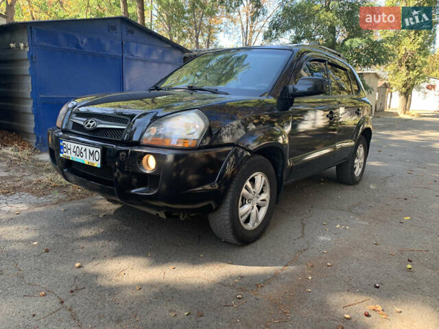 Черный Хендай Туксон, объемом двигателя 1.98 л и пробегом 260 тыс. км за 7777 $, фото 1 на Automoto.ua