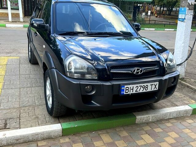 Черный Хендай Туксон, объемом двигателя 2 л и пробегом 151 тыс. км за 9000 $, фото 1 на Automoto.ua