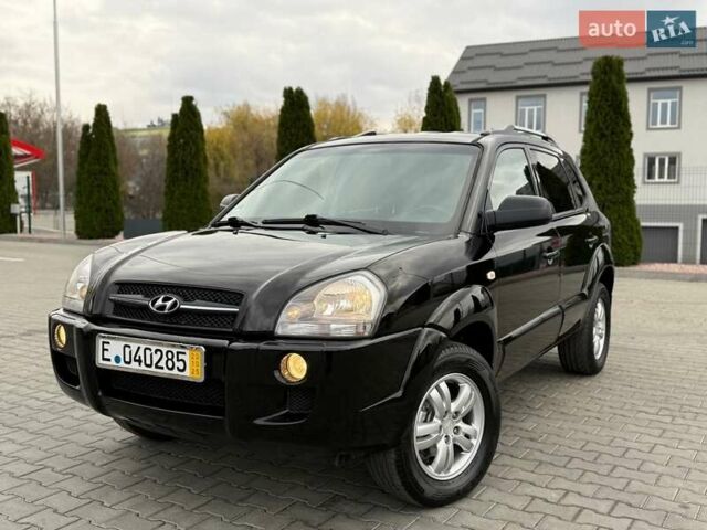 Черный Хендай Туксон, объемом двигателя 1.98 л и пробегом 239 тыс. км за 8700 $, фото 1 на Automoto.ua