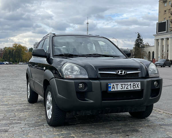 Черный Хендай Туксон, объемом двигателя 2 л и пробегом 120 тыс. км за 9500 $, фото 1 на Automoto.ua