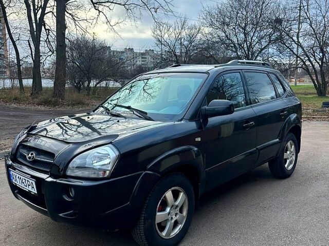 Черный Хендай Туксон, объемом двигателя 2 л и пробегом 215 тыс. км за 6700 $, фото 1 на Automoto.ua