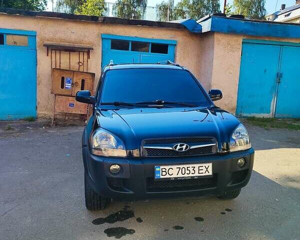 Черный Хендай Туксон, объемом двигателя 1.98 л и пробегом 330 тыс. км за 8200 $, фото 1 на Automoto.ua