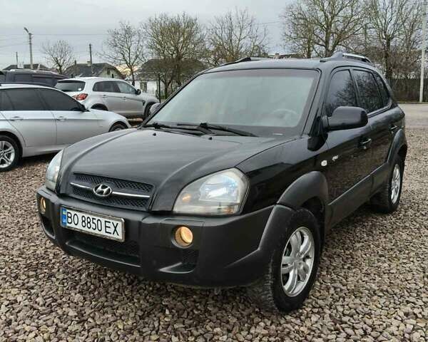 Чорний Хендай Туксон, об'ємом двигуна 2 л та пробігом 185 тис. км за 7499 $, фото 1 на Automoto.ua