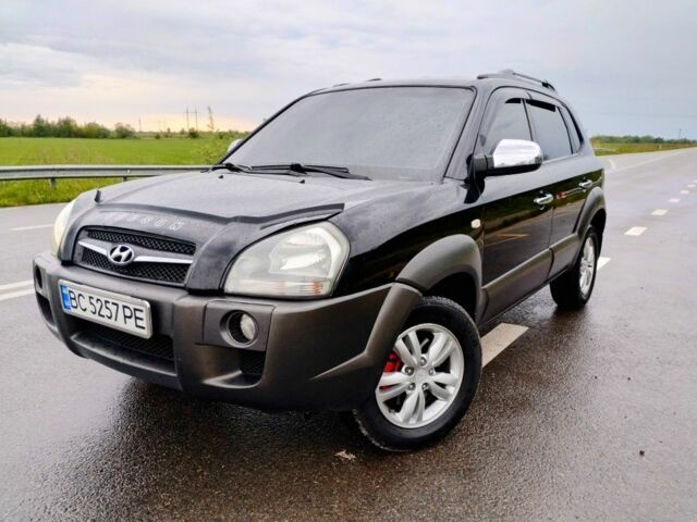 Черный Хендай Туксон, объемом двигателя 2 л и пробегом 260 тыс. км за 8450 $, фото 1 на Automoto.ua