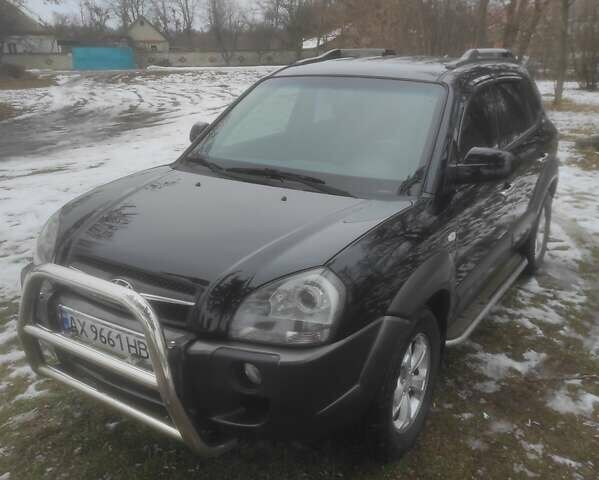 Черный Хендай Туксон, объемом двигателя 2 л и пробегом 167 тыс. км за 8500 $, фото 1 на Automoto.ua