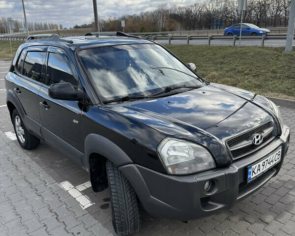 Чорний Хендай Туксон, об'ємом двигуна 1.98 л та пробігом 318 тис. км за 7399 $, фото 1 на Automoto.ua