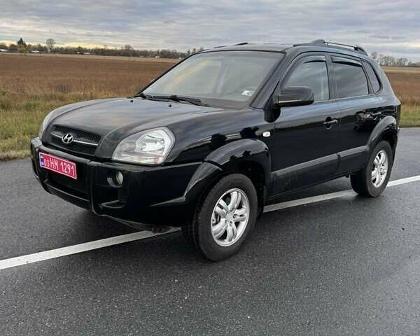 Черный Хендай Туксон, объемом двигателя 2 л и пробегом 253 тыс. км за 8299 $, фото 1 на Automoto.ua