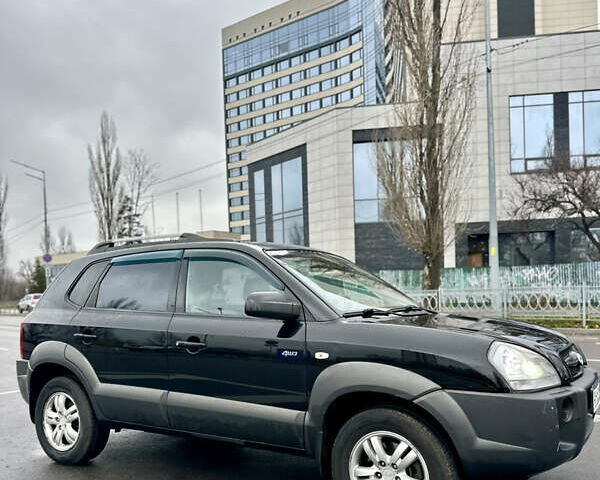 Чорний Хендай Туксон, об'ємом двигуна 1.98 л та пробігом 238 тис. км за 8499 $, фото 1 на Automoto.ua