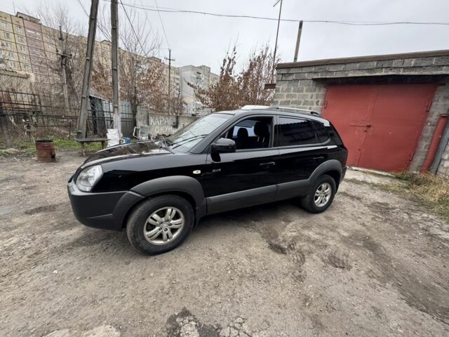 Чорний Хендай Туксон, об'ємом двигуна 2 л та пробігом 156 тис. км за 9200 $, фото 1 на Automoto.ua
