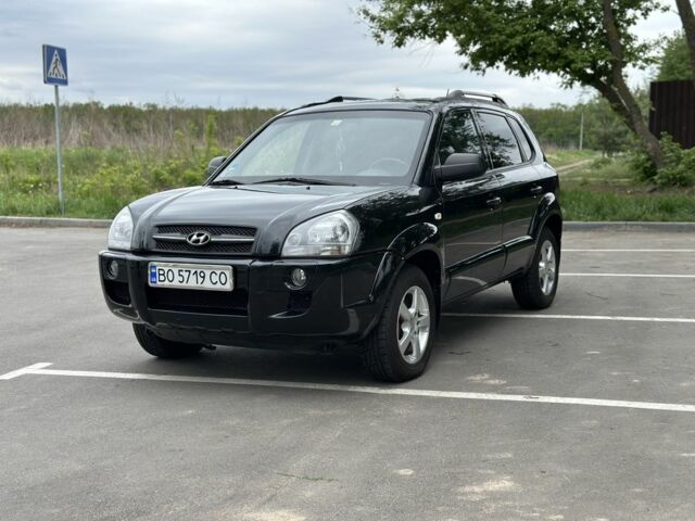 Черный Хендай Туксон, объемом двигателя 2 л и пробегом 233 тыс. км за 7500 $, фото 1 на Automoto.ua