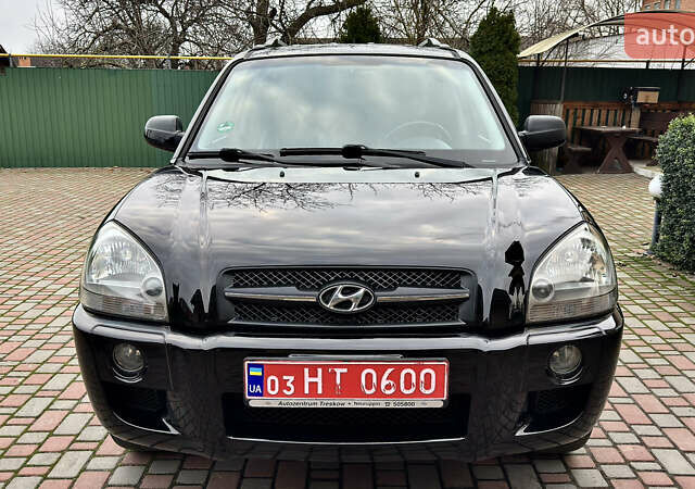 Чорний Хендай Туксон, об'ємом двигуна 2 л та пробігом 182 тис. км за 8299 $, фото 1 на Automoto.ua