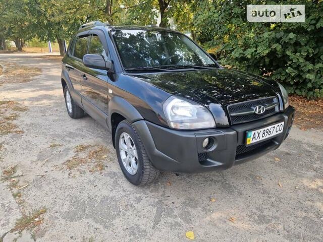Черный Хендай Туксон, объемом двигателя 1.98 л и пробегом 181 тыс. км за 9200 $, фото 1 на Automoto.ua