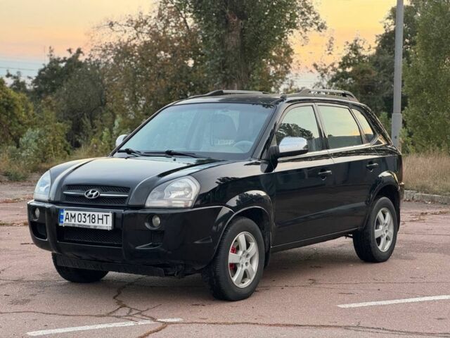 Черный Хендай Туксон, объемом двигателя 2 л и пробегом 353 тыс. км за 6800 $, фото 1 на Automoto.ua