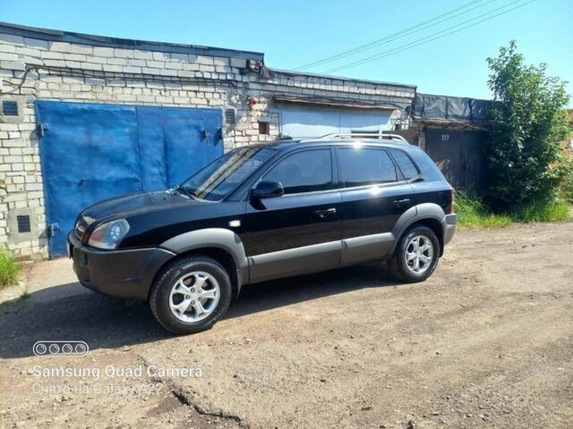 Чорний Хендай Туксон, об'ємом двигуна 2 л та пробігом 190 тис. км за 7900 $, фото 1 на Automoto.ua