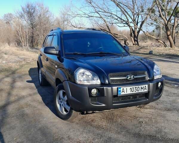 Чорний Хендай Туксон, об'ємом двигуна 2 л та пробігом 191 тис. км за 8700 $, фото 1 на Automoto.ua