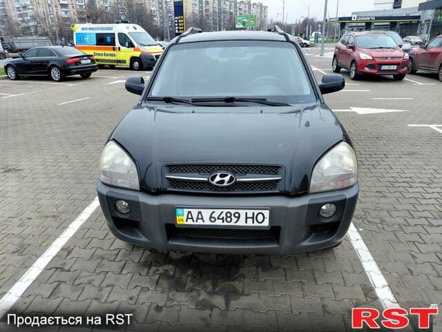 Чорний Хендай Туксон, об'ємом двигуна 2 л та пробігом 106 тис. км за 8350 $, фото 1 на Automoto.ua