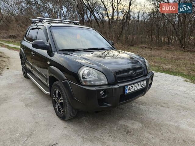 Черный Хендай Туксон, объемом двигателя 2 л и пробегом 182 тыс. км за 9000 $, фото 1 на Automoto.ua