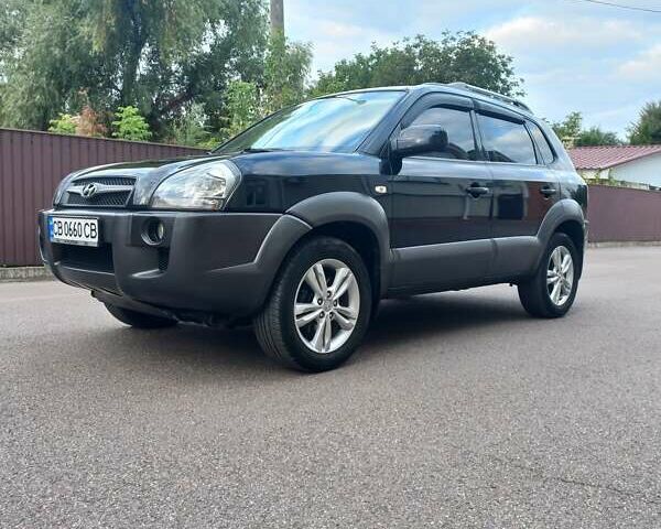 Черный Хендай Туксон, объемом двигателя 2 л и пробегом 168 тыс. км за 9000 $, фото 1 на Automoto.ua