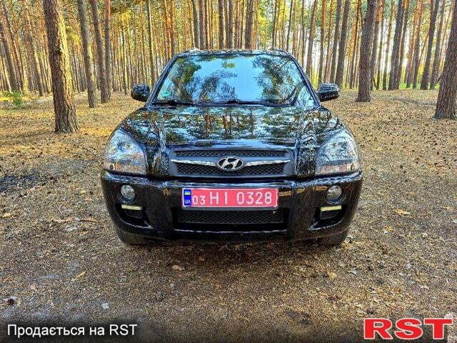 Черный Хендай Туксон, объемом двигателя 2 л и пробегом 204 тыс. км за 8900 $, фото 1 на Automoto.ua
