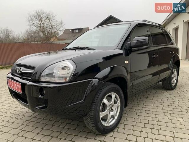 Черный Хендай Туксон, объемом двигателя 2 л и пробегом 114 тыс. км за 8850 $, фото 1 на Automoto.ua