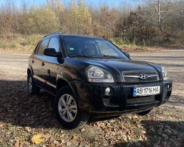 Черный Хендай Туксон, объемом двигателя 1.98 л и пробегом 180 тыс. км за 7999 $, фото 1 на Automoto.ua