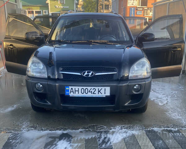 Черный Хендай Туксон, объемом двигателя 2.7 л и пробегом 170 тыс. км за 6000 $, фото 1 на Automoto.ua