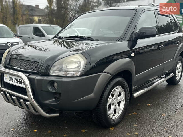 Чорний Хендай Туксон, об'ємом двигуна 1.98 л та пробігом 230 тис. км за 8700 $, фото 1 на Automoto.ua