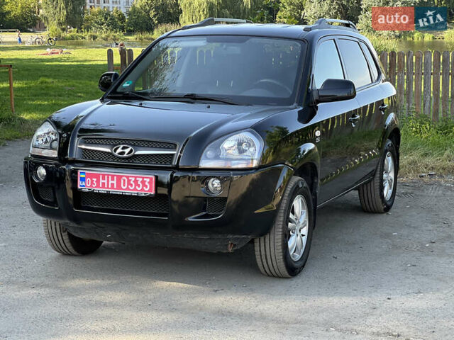 Черный Хендай Туксон, объемом двигателя 2 л и пробегом 243 тыс. км за 8000 $, фото 1 на Automoto.ua