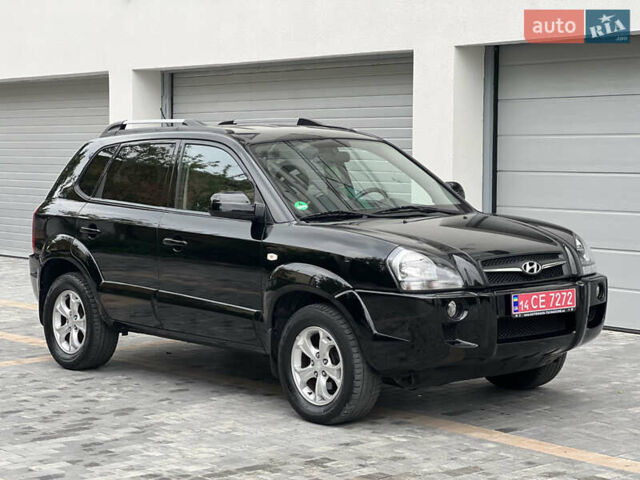 Чорний Хендай Туксон, об'ємом двигуна 2 л та пробігом 163 тис. км за 9199 $, фото 1 на Automoto.ua