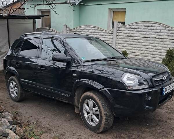 Черный Хендай Туксон, объемом двигателя 1.98 л и пробегом 128 тыс. км за 8100 $, фото 1 на Automoto.ua