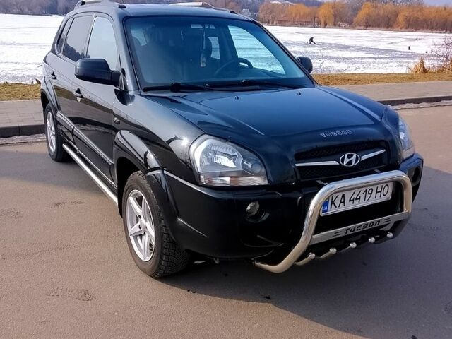 Черный Хендай Туксон, объемом двигателя 2 л и пробегом 182 тыс. км за 9200 $, фото 1 на Automoto.ua