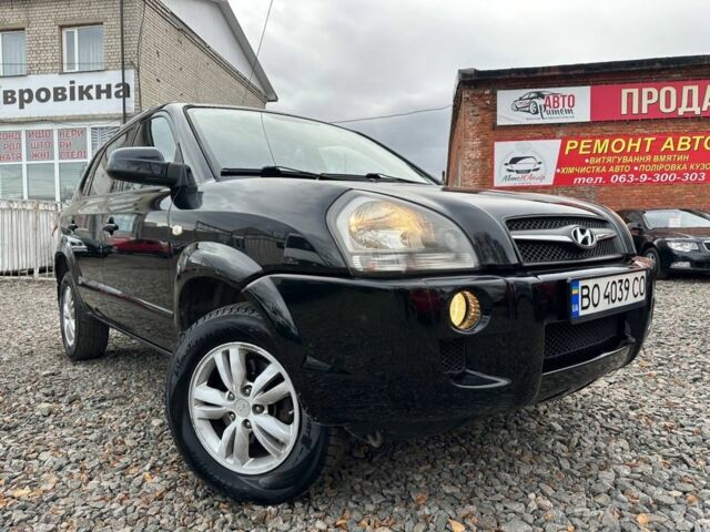 Черный Хендай Туксон, объемом двигателя 2 л и пробегом 166 тыс. км за 7500 $, фото 1 на Automoto.ua