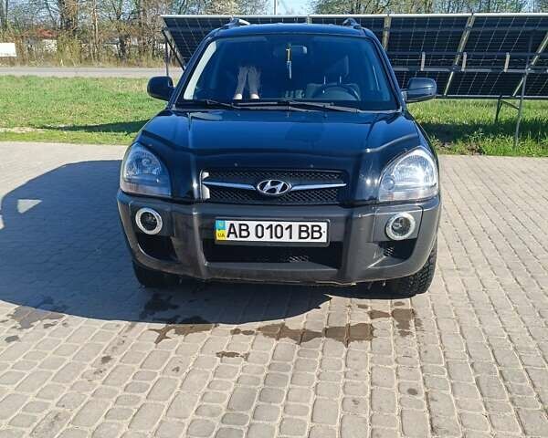Чорний Хендай Туксон, об'ємом двигуна 1.98 л та пробігом 55 тис. км за 11200 $, фото 1 на Automoto.ua