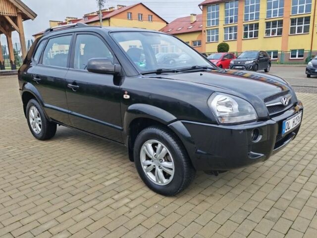 Чорний Хендай Туксон, об'ємом двигуна 1.98 л та пробігом 148 тис. км за 6199 $, фото 1 на Automoto.ua