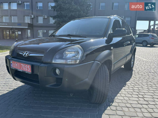 Черный Хендай Туксон, объемом двигателя 2 л и пробегом 137 тыс. км за 8800 $, фото 1 на Automoto.ua