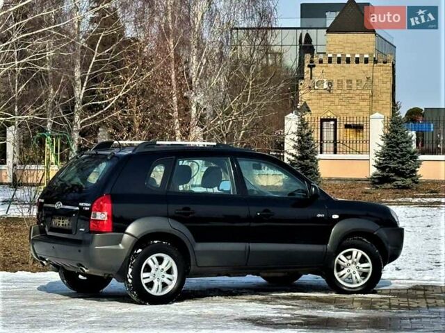 Чорний Хендай Туксон, об'ємом двигуна 2 л та пробігом 93 тис. км за 11500 $, фото 1 на Automoto.ua