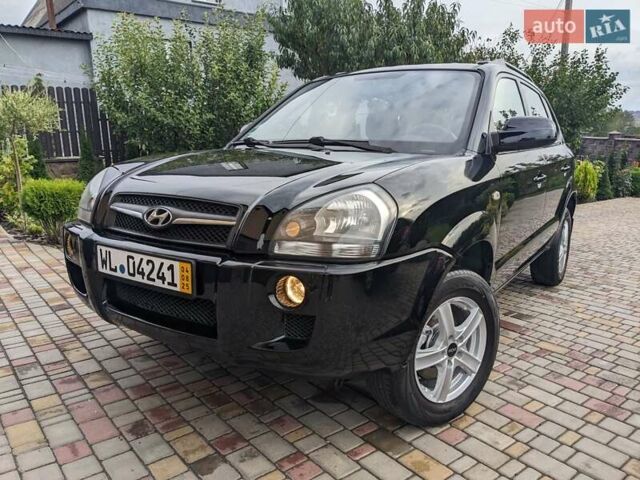 Чорний Хендай Туксон, об'ємом двигуна 2 л та пробігом 217 тис. км за 7700 $, фото 1 на Automoto.ua