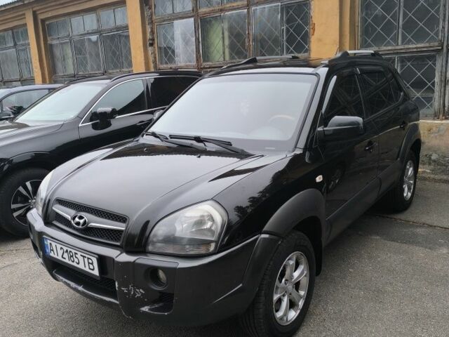 Черный Хендай Туксон, объемом двигателя 2 л и пробегом 237 тыс. км за 7500 $, фото 1 на Automoto.ua