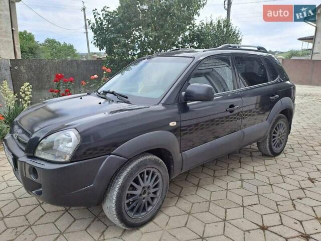 Чорний Хендай Туксон, об'ємом двигуна 1.98 л та пробігом 253 тис. км за 8500 $, фото 1 на Automoto.ua