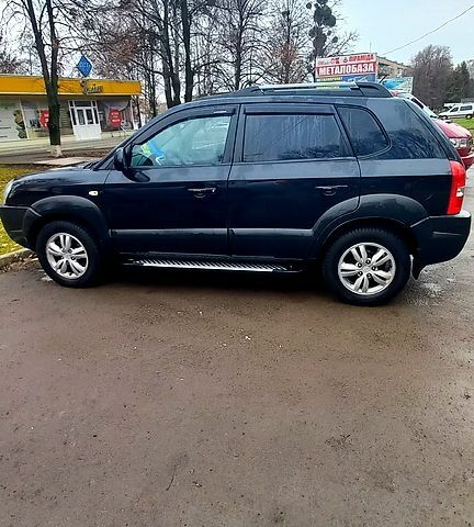 Чорний Хендай Туксон, об'ємом двигуна 2 л та пробігом 177 тис. км за 8100 $, фото 1 на Automoto.ua