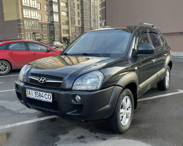 Чорний Хендай Туксон, об'ємом двигуна 1.98 л та пробігом 180 тис. км за 7950 $, фото 1 на Automoto.ua