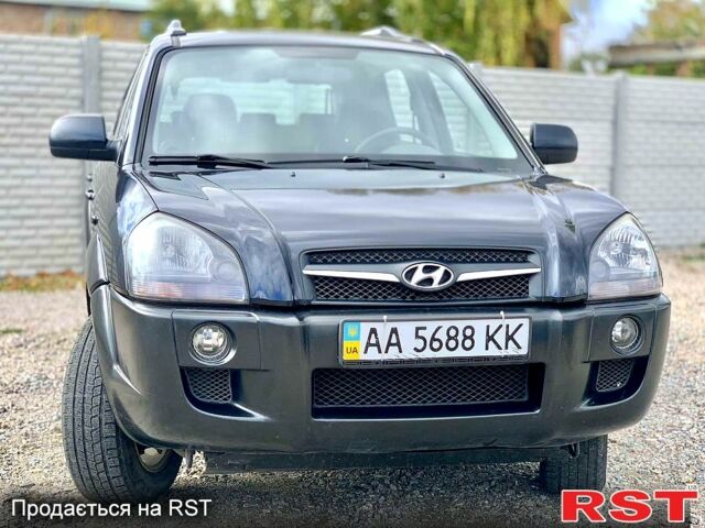 Чорний Хендай Туксон, об'ємом двигуна 2 л та пробігом 158 тис. км за 8500 $, фото 1 на Automoto.ua