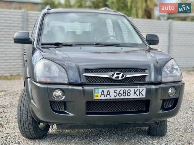Черный Хендай Туксон, объемом двигателя 1.98 л и пробегом 158 тыс. км за 8200 $, фото 1 на Automoto.ua