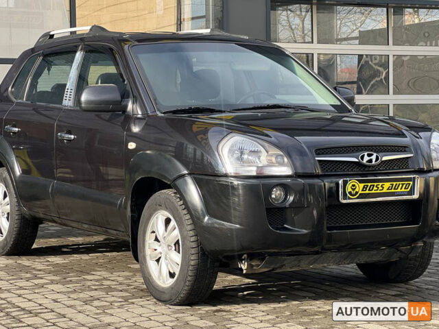 Черный Хендай Туксон, объемом двигателя 2 л и пробегом 178 тыс. км за 9600 $, фото 1 на Automoto.ua