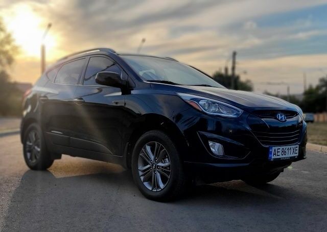 Черный Хендай Туксон, объемом двигателя 2.4 л и пробегом 130 тыс. км за 12400 $, фото 1 на Automoto.ua