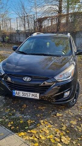 Чорний Хендай Туксон, об'ємом двигуна 2.4 л та пробігом 200 тис. км за 11000 $, фото 1 на Automoto.ua