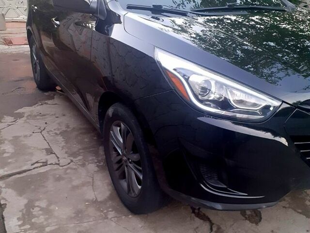 Черный Хендай Туксон, объемом двигателя 2 л и пробегом 180 тыс. км за 13000 $, фото 1 на Automoto.ua