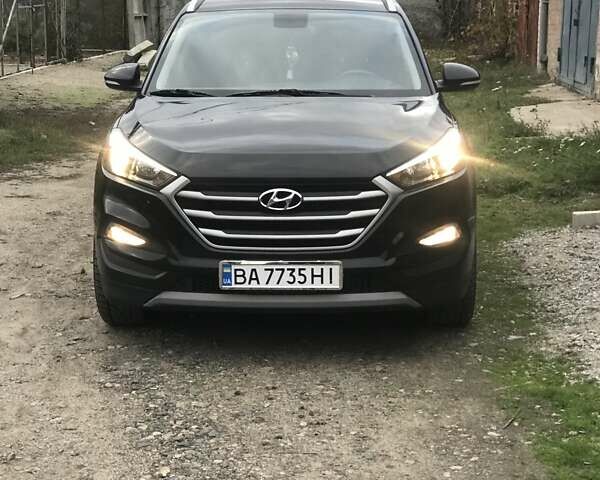 Черный Хендай Туксон, объемом двигателя 1.59 л и пробегом 188 тыс. км за 15500 $, фото 1 на Automoto.ua